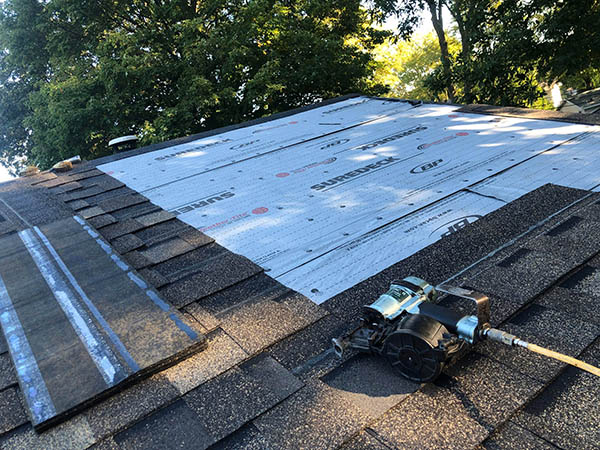 New shingles going on over fresh underlayment