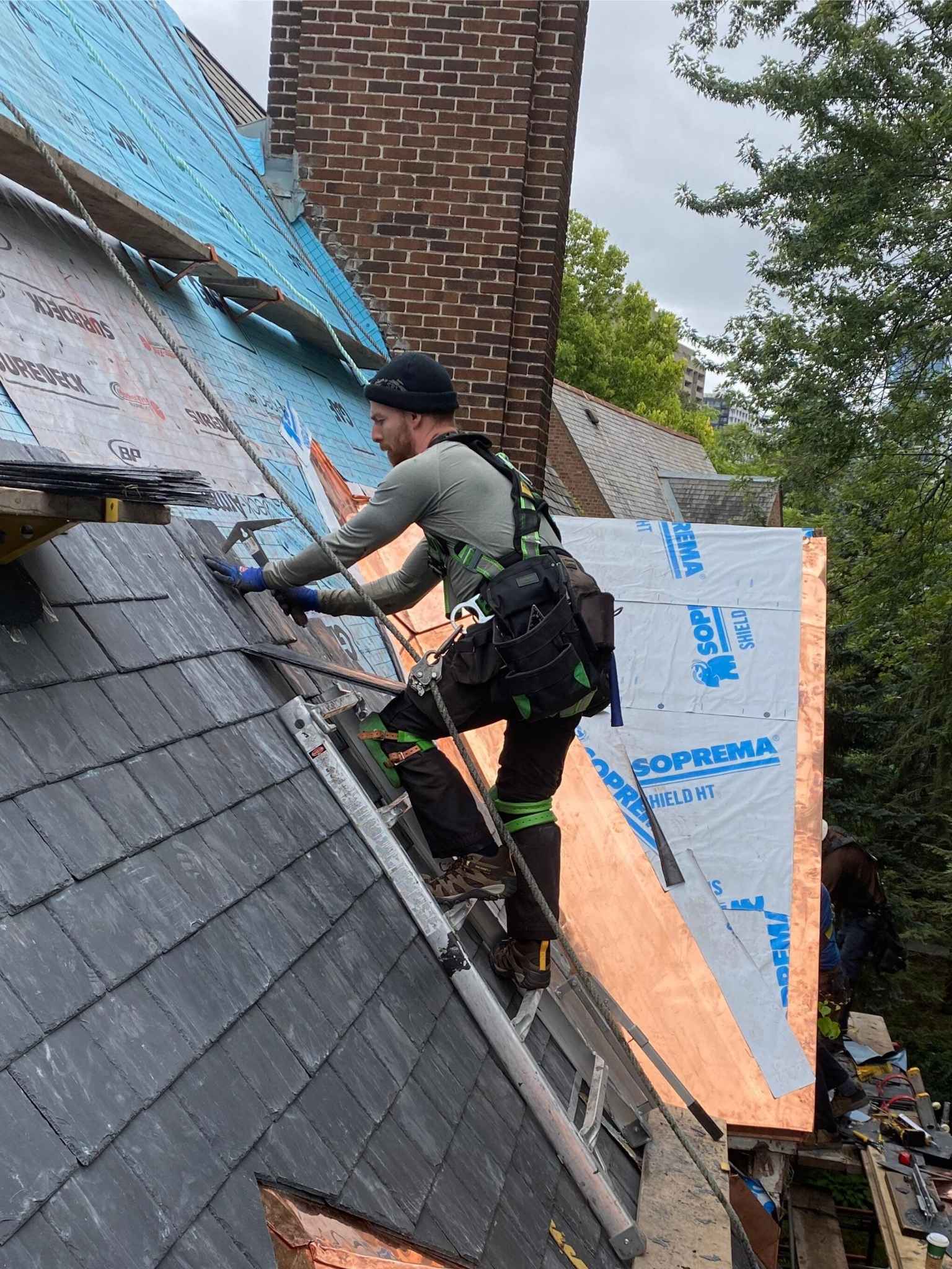 A Beautiful Slate roof, masterfully redone on Holton av.