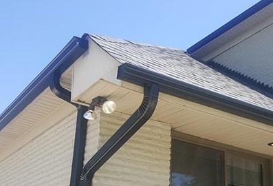 New gutters and downspouts