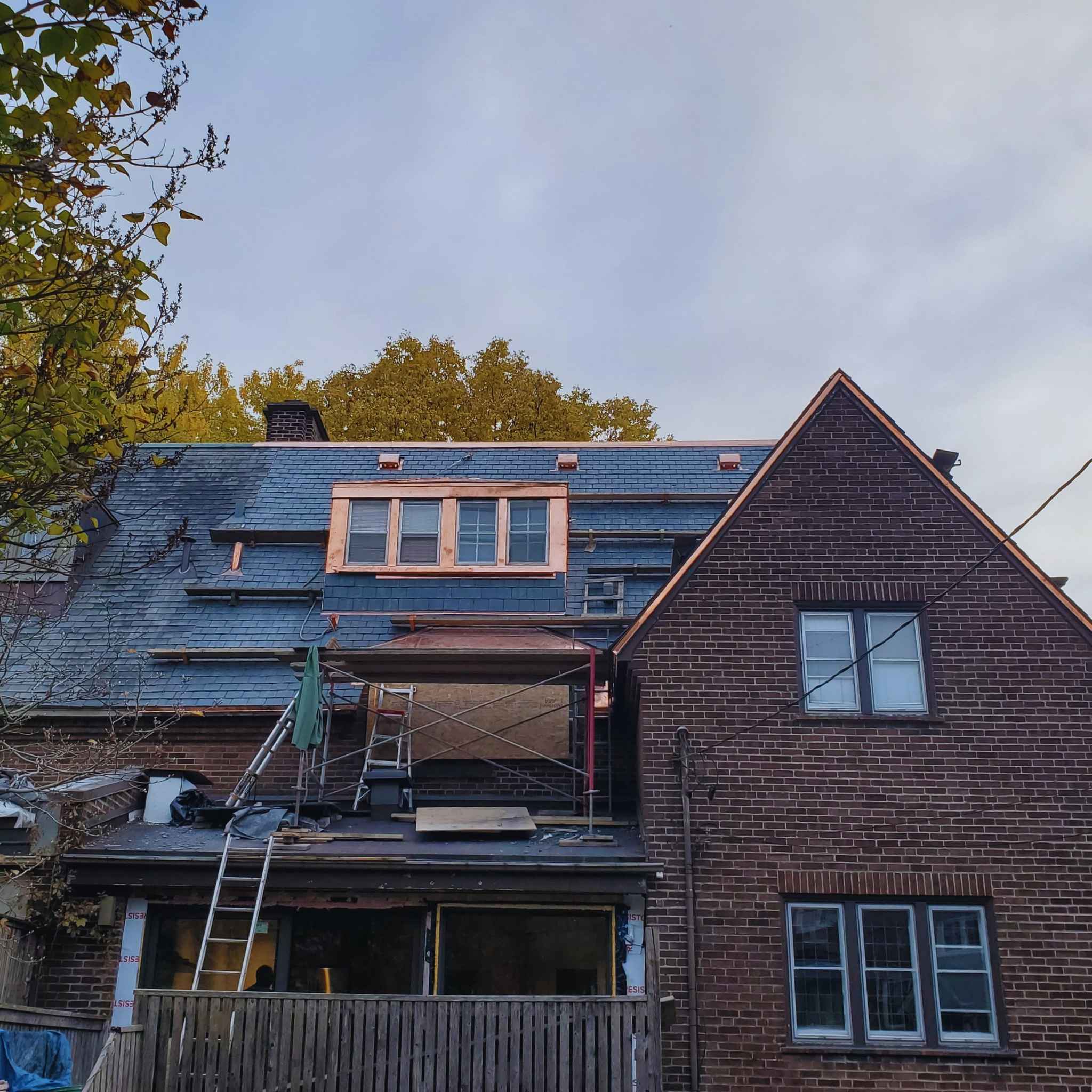 Slate roof with copper dormers, restored by our crew